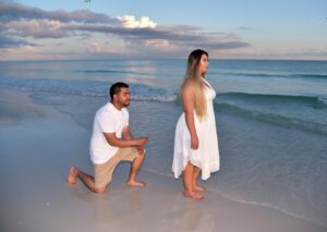 Couple with man on one knee