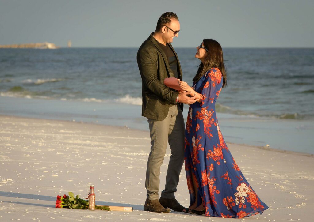 Surprise Engagement with props in Destin Florida.