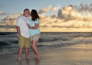 Couple sunset beach photo