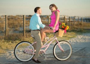 Cute engagement photo on a bicycle