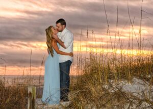 Couple in beach engagement photo shoot