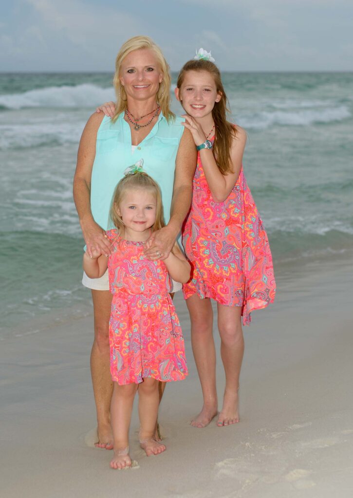 Mom and Daughters on beach.