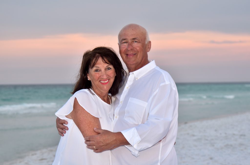 Couple standing on Destin Beach.