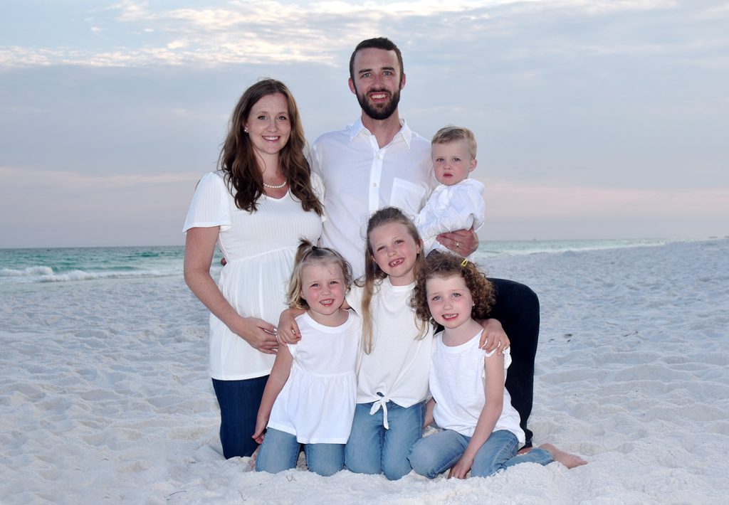 Family photographer in Sandestin captures maternity photos.