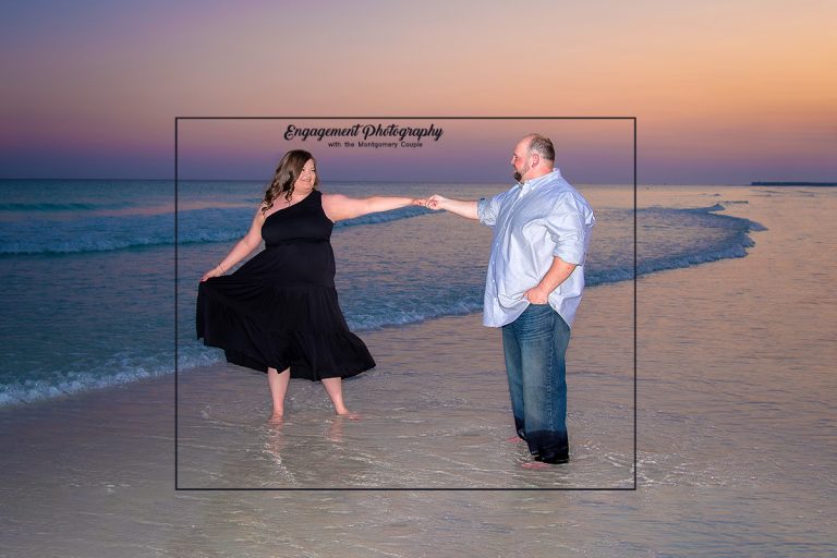Engagement Photographer in Destin captures couple dancing on beach.